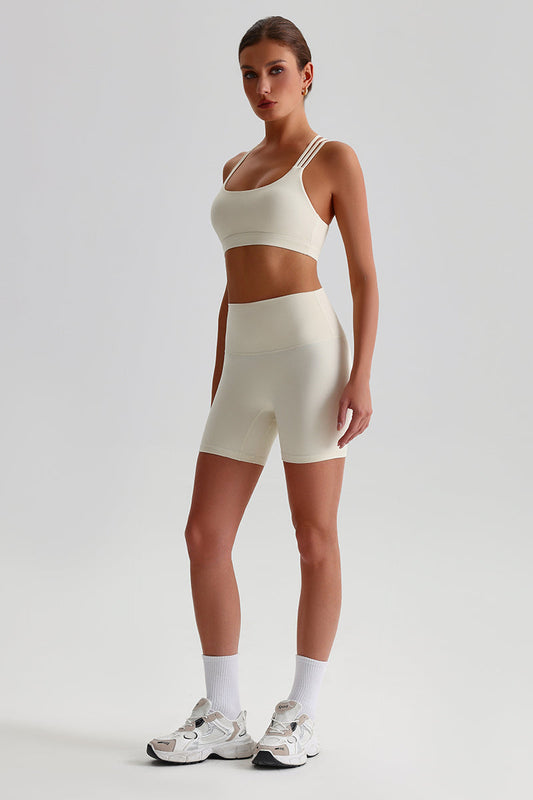 Women Naked Sensation Yoga Shorts Set: Cross-Back Bra + High-Waisted Sculpting Shorts