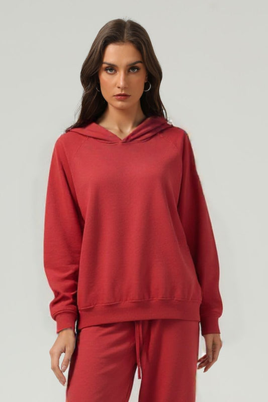 Washed raglan sleeve hooded sweatshirt