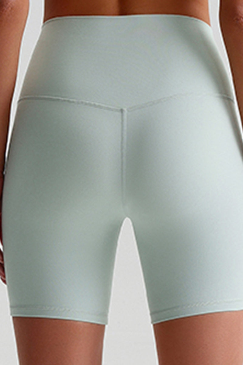 Women Naked Sensation Yoga Shorts Set: Cross-Back Bra + High-Waisted Sculpting Shorts