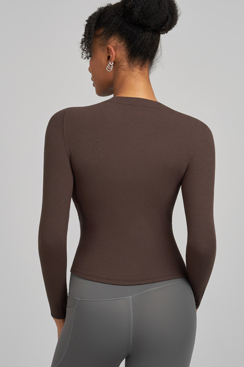 Women's long-sleeved, form-fitting sports top