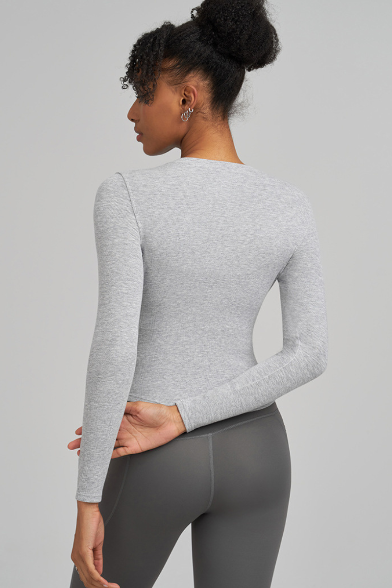 Women's long-sleeved, form-fitting sports top